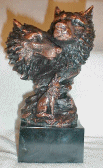 Two large Wolf heads and one small Wolf statue copper color Wolf Collectible